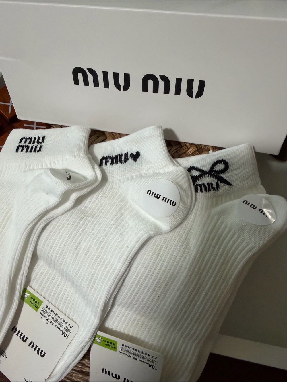 Miu Miu White Ankle Socks with Black Logo Accents